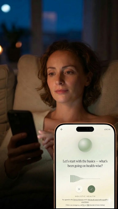 User engaging with Holistic Health AI chat on couch in the evening